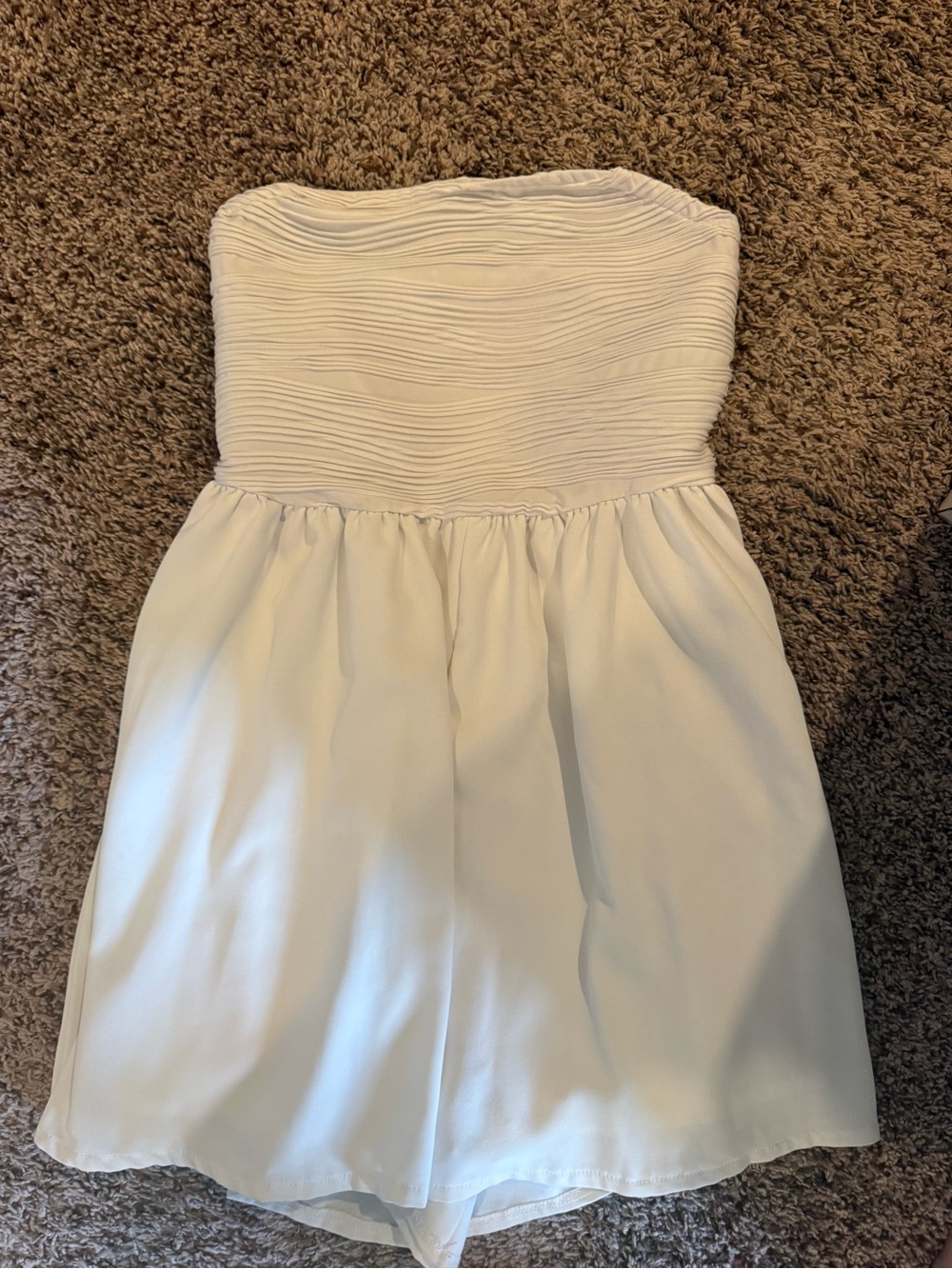 SHEIN Black Logo Clothing Tag on White Garment